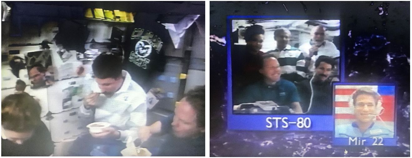 Thanksgiving 1996. From left, STS-80 astronauts Tamara E. Jernigan, Kent V. Rominger, and Thomas D. Jones enjoy Thanksgiving dinner in Columbia’s middeck. Right: The STS-80 crew during aboard Columbia exchange Thanksgiving greetings with John E. Blaha aboard the Mir space station. Credits: NASA