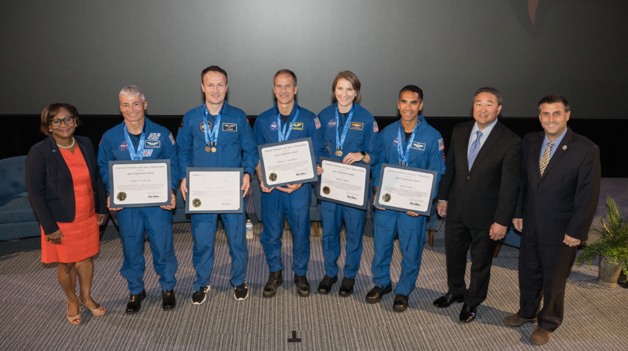 Five International Space Station Expedition 66 astronauts were reunited at Space Center Houston on Oct. 13, 2022, in a ceremony to share their mission and recognize employees on the ground who made it happen. From left to right: William Harris, president and CEO of Space Center Houston; Mark Vende Hei, NASA astronaut and Expedition 64, 65, and 66 flight engineer; Matthias Maurer, ESA astronaut and Expedition 66 flight engineer; Tom Marshburn, NASA astronaut and Expedition 66 flight engineer; Kayla Barron, NASA astronaut and Expedition 66 flight engineer; and Raja Chari, NASA astronaut and Expedition 66 flight engineer. Credits: NASA/Josh Valcarcel