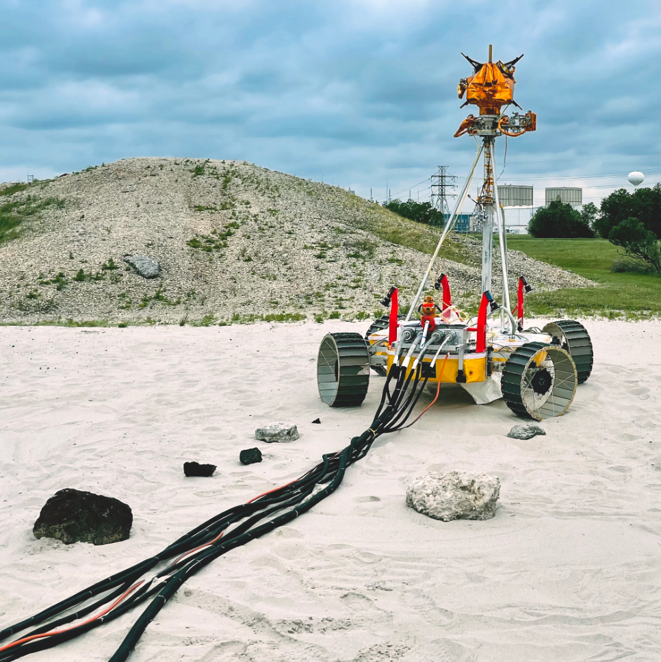 Engineers recently tested a decked-out version of a VIPER prototype – the most realistic yet – seen here during checkout and preparation activities at the Planetary Analog Test Site, known as the Rock Yard, at NASA's Johnson Space Center in Houston. By adding a few parts to simulate the Moon rover’s center of gravity, a new mast to carry cameras and antennas, a new computer, new flight software, and new motor controllers – this newest prototype is equipped with the latest-and-greatest. It's now wrapping up a recent round of testing at NASA's Glenn Research Center in Cleveland, which includes egress testing using a structural test model of Astrobotic’s Griffin lunar lander and trying out the prototype's ability to drive while keeping its antenna pointing in the exact same direction. Credits: NASA/Arno Rogg