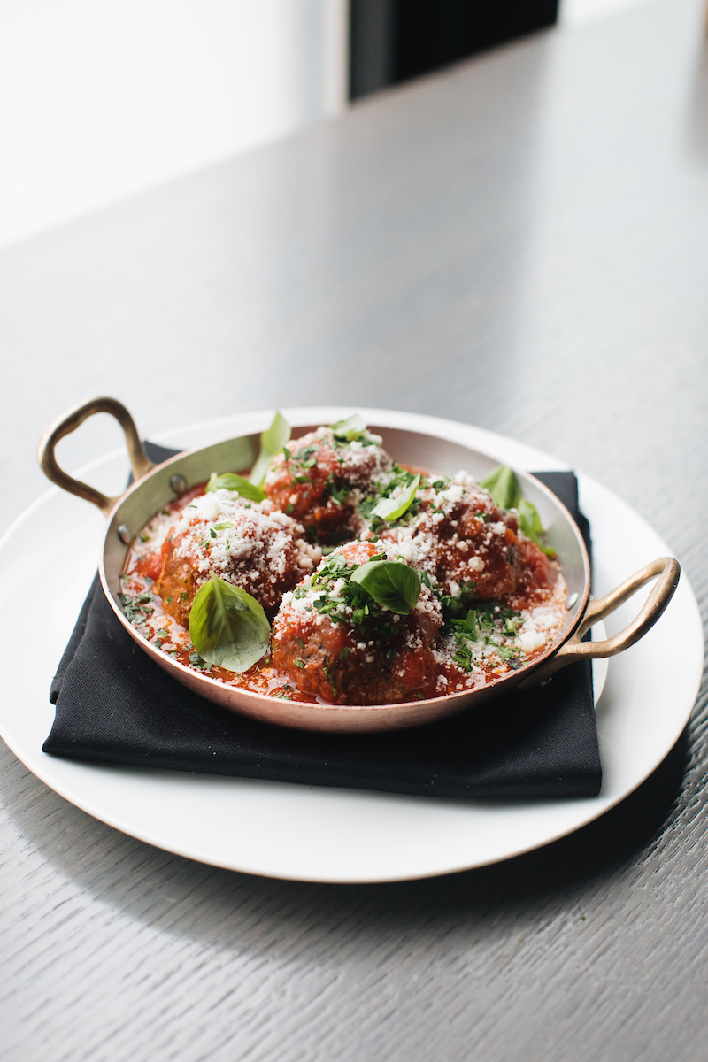 Beef meatballs in a copper skillet 