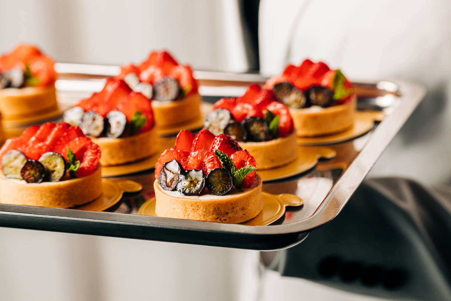 Fruit tart with berries and fresh mint. 