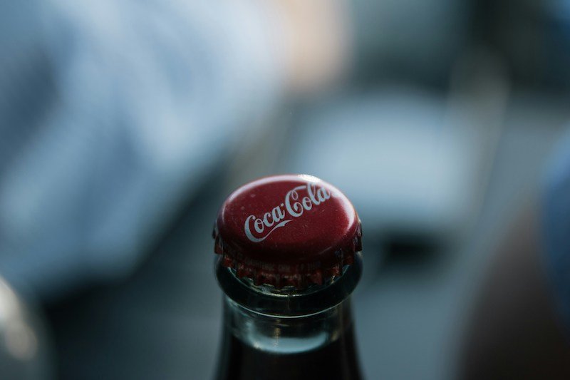 QR codes and hashtags key as Tesco grocery delivery vans receive a Coca-Cola festive makeover