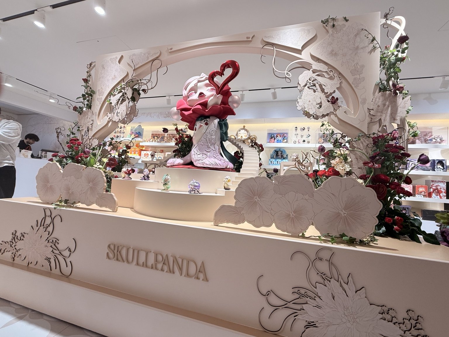    Pop Mart’s SkullPanda Petals in Four Acts exhibition at Harrods, showcasing a floral-themed instillation as part of it’s London retail activation.    