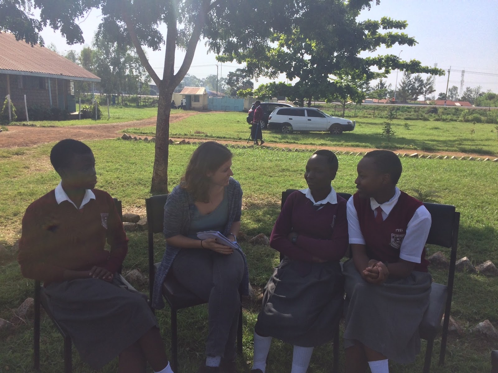 Person in Kisumu rural Kenya learning about menstrual cups