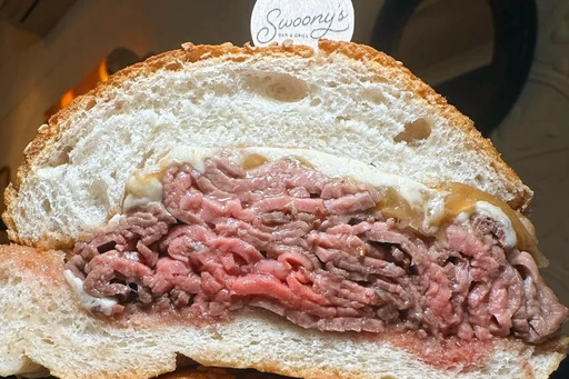 Swoony's Brooklyn is a charming American bistro that’s already winning hearts.
Their burger, served on a Portuguese bun, may have cracked our top 10 list.
Don’t miss out on the short rib au poivre, and if you’re looking for a sweet finish, their French toast pairs perfectly with the soft serve!