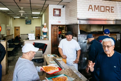 These restaurants make you fall in love with New York again!
Lillo Cucina
Inside this Cobble Hill restaurant, youâll find six tables, 17 seats, and one man who runs the show. But once you taste Lilloâs beautifully simple dishes (almost all under $20), like sauteed artichokes swimming in olive oil, and a saucy rigatoni alla gricia, you'll understand why it's been going strong since 2017. Get a heap of tiramisu before leaving.
Amore Pizzeria
When you need to get away, head to Amore. more is just Amore. Itâs a no-nonsense joint in a strip mall where friendly-enough employees have been churning out consistently perfect pies since the 1970s. The cheese is greasy, the lights are fluorescent, and the crust-to-sauce ratio is, yes, on point.
Red Hook Tavern
Everybody orders the burger, and nobody shares. That means that at any given moment at this corner spot on Van Brunt Street, 40 burgers are being consumed by 40 people at 40 seats. The silent, side-by-side consumption might make you feel closer to 39 complete strangers than you have to anyone in months. Reserve a spot at the bar, and sip on a martini, stirred by the bartender who also likes to bake, and made some rainbow cookies tonight. Suddenly, New York feels like a very small town.