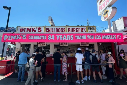 Celebrate National Hot Dog Month at one of old-school hot dog spots
Pink’s has been a Hollywood legend since 1939. You can choose from popular favorites like the Lord of the Rings Dog topped with BBQ sauce and onion rings or the Martha Stewart Dog topped with sauteed onions, mushrooms, nacho cheese, bacon, but Pink’s Famous Chili Dog with mustard, chili, onions is still an iconic classic for a reason. Plus, it was a favorite spot of Anthony Bourdain. You can’t get a better recommendation!
July is National Hot Dog Month. From cookouts to Independence Day celebrations to National Hot Dog Day on July 17th, we’ve got all the reasons to grab a delicious hot dog this month.