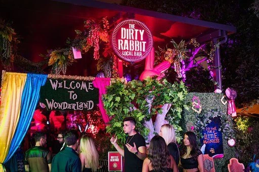 ⭐ The Dirty Rabbit is Wynwood’s premier nightlife destination bringing non-stop dancing, good vibes, and the hottest beats in town.
Meet The Dirty Rabbit Club, the ultimate nightlife destination in Wynwood. Located in the heart of Miami’s Art District, The Dirty Rabbit transports you to a magical wonderland with a different theme and party every day of the week. Get your tickets for The Dirty Rabbit in Wynwood, Miami!
This vibrant escape in Miami’s Wynwood Arts District has indoor bars, plenty of outdoor space to dance, incredible music, an unbeatable atmosphere, and electrifying energy every day of the week!
Highlights
🎵 Dance along to open-format & Latin-oriented music
🕺 Open until 3 a.m., so the party never has to end
☀️ Day parties start at 3 p.m. on Saturday & 2 p.m. on Sunday
General Info
📅 Dates and times: select your dates/times directly in the ticket selector
👤 Age requirement: 21+ with valid ID
👕 Dress Code: please note dress code is strictly enforced