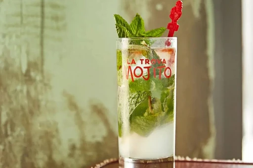 Cocktail Celebrations at Cafe La Trova
Little Havana’s award-winning cantinero cocktail haven toasts July with back-to-back parties celebrating—what else?—classic cocktails.
Kick-off National Mojito Day on July 11th with $8 classic and exotic mango mojitos from 4pm to midnight.
Then, drink to National Daiquiri Day on the 19th with three $8 signature daiquiris, featuring a guest bartender straight from Cuba’s famed Floridita Bar.
Top off the fiestas with a night of Tequila Mijenta on the 24th, featuring 1-oz pours for $24 all night long. ¡Salud!