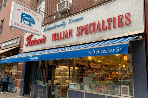 The Best Sandwich Shop in NYC!
Faicco's Italian Specialities
A West Village staple with an army of employees pacing behind an L-shaped counter, Faicco’s has been on Bleecker Street since the 1940s. Originally, it was just a pork store, but now the little shop sells Italian pantry items, prepared foods, and oversized sandwiches that could sink a small sailboat if thrown correctly. Head to the back, and you’ll see a few whiteboards with signature offerings, like a meatball parm and a sandwich with sausage and broccoli rabe. If you’re feeling like a pioneer, you can customize your order with anything from sundried tomatoes to fistfuls of bacon.
The Order: The sandwich that comes with a stack of chicken cutlets, stretchy melted mozz, and housemade pesto that leaks out the sides.