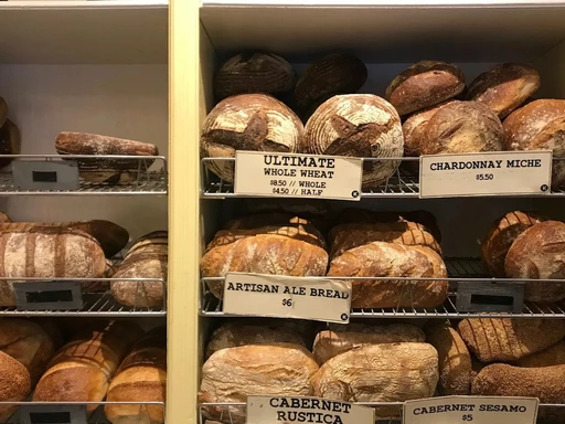 Essential Manhattan Bakery: Orwasher’s Bakery
One of the Upper East Side’s longest continually running businesses, Orwasher’s was founded by a Hungarian family in 1916. Today, it’s run by baker Keith Cohen, whose starters are spiked with different types of wine or lager.
The shop is best known for its rugelach, pumpernickel bread, spelt loaves, jelly doughnuts, and black-and-white cookies, but don’t miss the sticky-bun babka, chocolate croissants, seeded bagels, glazed doughnuts, turnovers, or cherry cheese strudel — it’s some of the best in the city.