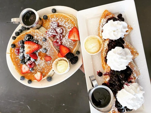 Millie's Cafe is incredible and also vegan friendly!
Today I went with the vegan/gluten-free waffles (whipped cream is also vegan).. the texture and flavor was perfect. My mother who isn’t a fan of gluten free texture even approved!
You can add chocolate chips, blueberries, bananas, strawberries etc.. I also got a Lavender oat milk latte and vegan sausage.
Next time I plan on trying the gluten free pancakes! Will definitely be coming back. 10/10