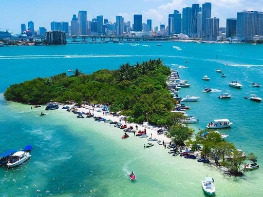 If you are looking for a secluded island in Miami to spend the day and disconnect, then here is one of my favorite spots!
The Picnic Islands are a small group of islands within the city of Miami. They are located just north of Biscayne Island in Biscayne Bay, just east offshore from the Edgewater and Upper Eastside districts of the city. The islands are uninhabited, but several of the group have beaches where boaters and picnickers frequent.
They are generally named for the mainland city parks that they are located next to in the bay. The southernmost one is Pace Picnic Island, located off Pace Park. There are also Morningside Picnic Islands Park and Legion Picnic Islands Park located directly off of Morningside Bayfront Park and Legion Park, respectively.