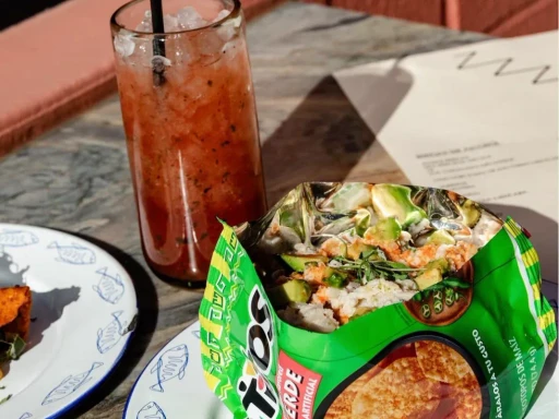 Mariscos Zazazá
Located in an alley just off the LA River Bike Path you’ll find a lunch window serving up the prettiest seafood plates in a sunlit patio that will transport you straight to a resort in Mexico. The yellowtail tostada with crisped capers is a must and their bottled hot sauces are some of the best in the city.