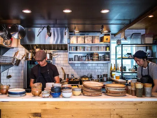 Okonomi/Yuji Ramen: The diminutive hard-to-get-into Japanese restaurant anchored in Brooklyn since 2014 has popped up in Nomad through at least October 27.
The restaurant is a vastly different vibe — a minimalist bright-lit narrow space with plenty of room — compared to its sibling, but it’s the same great fare. Both the daytime breakfast and nighttime ramen are available all day.
Consider the five-set Japanese breakfast with tilefish, egg, and various vegetables ($25). The shoyu ramen ($18) is pretty wonderful, too. I went with tea, but Japanese beers and Dassai Blue sake from the upstate brewery are on the menu, too.