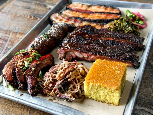 Hometown Bar-B-Que
Youâre probably going to have to wait an hour in line to get this (mostly) Texas-style barbecue. Once you make it to the counter of this Red Hook institution, though, the brisket, giant beef rib, and the lamb belly bĂĄnh mi will all be incredible. If youâre with a group, add some brisket tacos and Jamaican jerk baby back ribs, neither of which are essential but are still pretty great. Plan to visit on a weekend and make a day out of it.