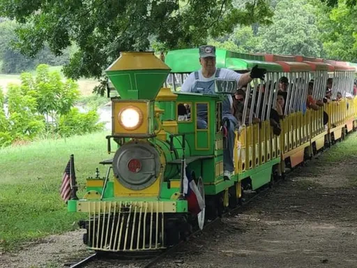 Historic Mini Train Rides in DFW: Forest Park Miniature Trains in Fort Worth🌟
Why we love it:
❤️ Forest Park Miniature Train is a historic railway that dates back to the late 1950s! When it opened, it was the longest miniature railway in the world.
❤️ The train travels 5 miles throughout Fort Worth’s Trinity Park and across the Trinity River.
❤️ It crosses 6 bridges and stops at a concession stand where you can purchase candy apples, cotton candy, and drinks.
Good to know:
- The train ride is about 50 minutes long. It generally departs at the top of each hour.
- There is plenty of free parking.
- This train is located near zoo!