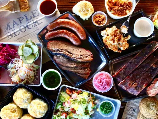 Maple Block Meat Co.
Barbecue
What: $9 five-piece wings, $10–12 nachos, $10 sliders, BOGO drinks
When: Mon 5–9pm, Tue–Fri 5–6pm
Why we love it: Meat butchered on premise, brisket smoked over peach wood logs, a pitmaster from Texas—this Culver City barbecue joint checks all the right boxes, including an excellent happy hour menu. Steeply discounted bar bites are available before 6pm, including nachos topped with your choice of smoked brisket or pork belly, a set of smashburger sliders and smoky, juicy wings with house white barbecue sauce or honey Sriracha. Best of all, it's available all night on Mondays. For drinks, there's a buy-one-get-one free deal on nearly all drinks, which you can also get the last hour of service any day of the week. (Some top shelf label exceptions do apply.)