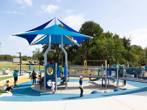 Windhaven Meadows Park is a 123-acre, passive recreational park complete with walking trails, ponds, and natural open spaces.
Additional features include: 330 parking spaces, restrooms, 1.9 miles of concrete trails, 4,800-square-foot reservable pavilion, splash pad water feature (open the first Saturday in April and closes after the third weekend in October), Liberty Playground featuring more than 20,000 sq. ft. of accessible play equipment, and a 4.6-acre dog park.