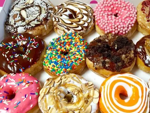 Best Donuts in Dallas: Ferguson Donut Shop
North Texas’s nouveau shops have gotten so distracted by cream-filled this and topped with that, they seem to have forgotten how to make a basic melt-in-your-mouth, glazed old-fashioned.
We’re over the theatrics (and prices, my goodness) and suggest finding your local, satisfying ring-slinger whose signage simply reads “Donuts.” Ferguson is our fave.