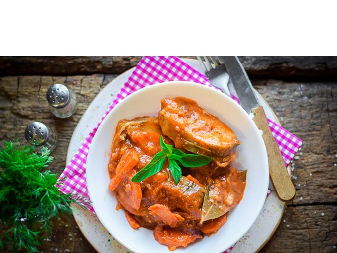 Delicious pollock with carrots and onions in tomato - a quick recipe with step by step photos