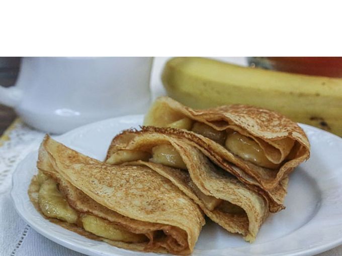 Pancakes with banana filling. Recipe photo