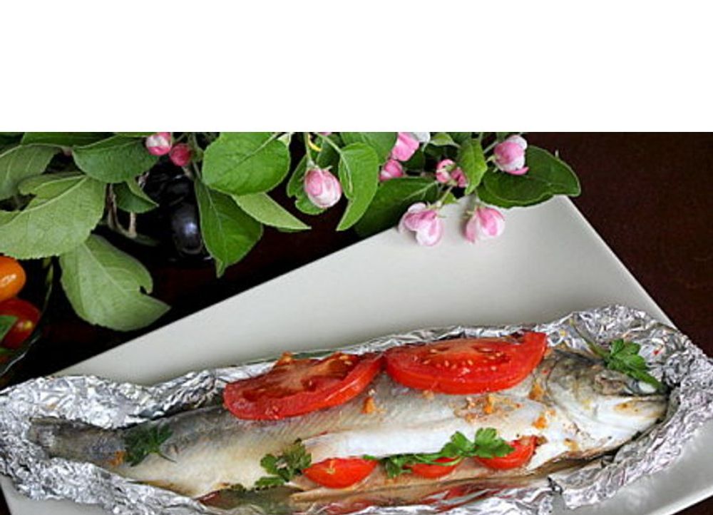 Trout baked in the oven in foil