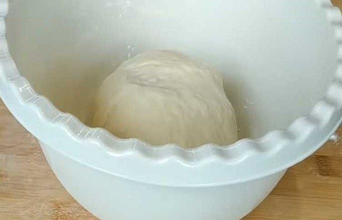  lump of dough in a bowl 