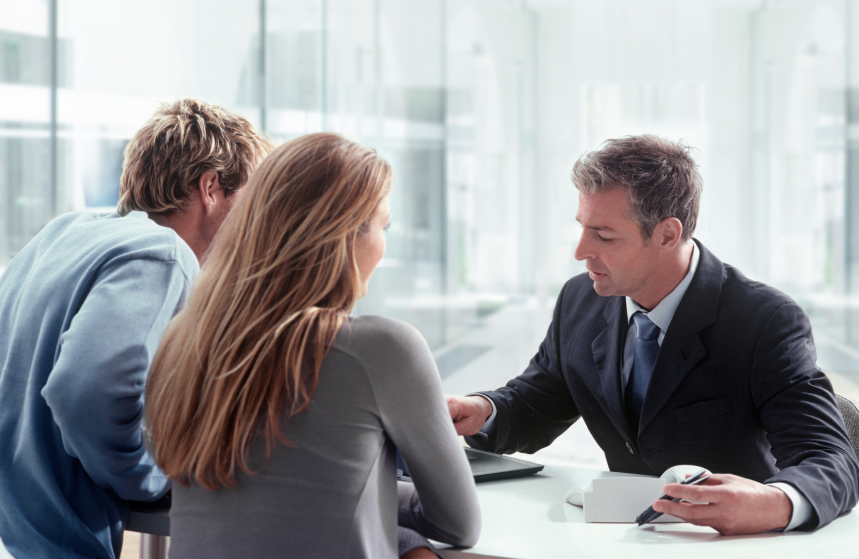 lawyer reviewing documents with client