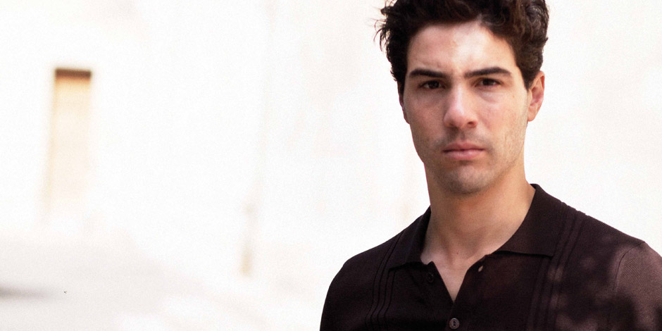 Tahar Rahim looking directly into the camera