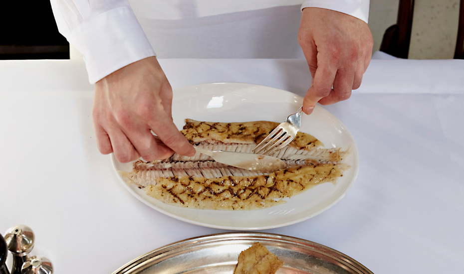 Dover sole: push the fish meat away from the spine to the edges of the plate