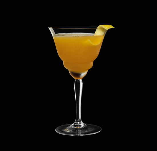 The Precursor, served in a tall Martini glass with a slice of lemon juice