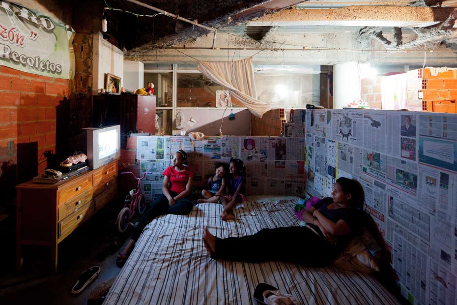 Life inside the Tower of David: A family relax in their living quarters. Photograph