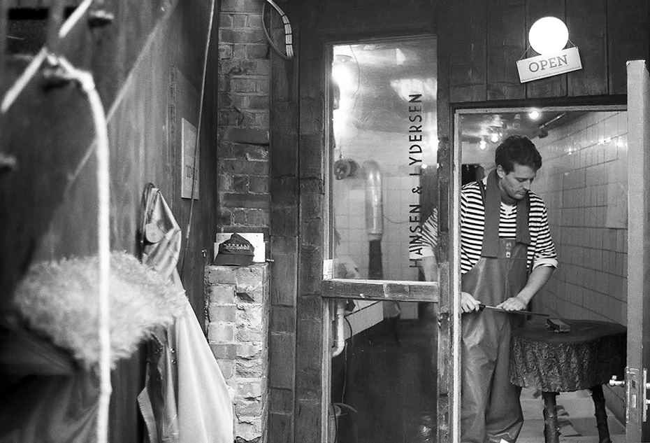 ole-sharpening-his-knife,-ready-to-fillet-the-salmon