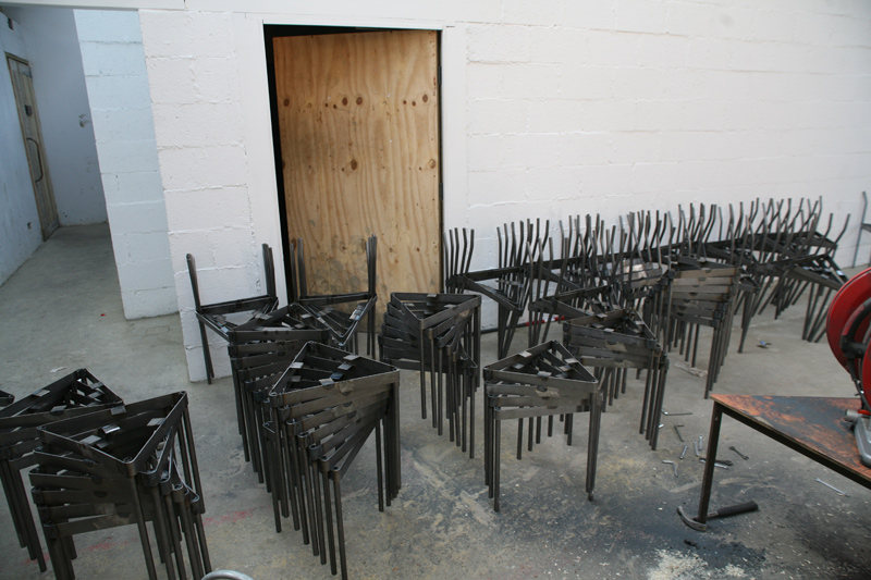 Stacked chairs waiting to go