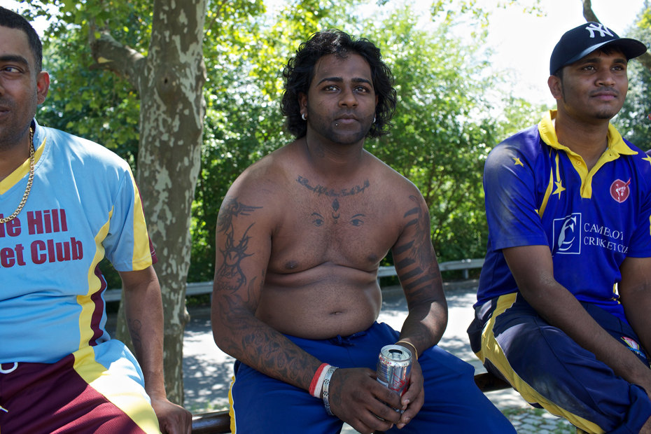 Players watch a game from stands at Baisley Pond Park in Queens. The park is an undisputed nucleus of the Queens cricketing community.