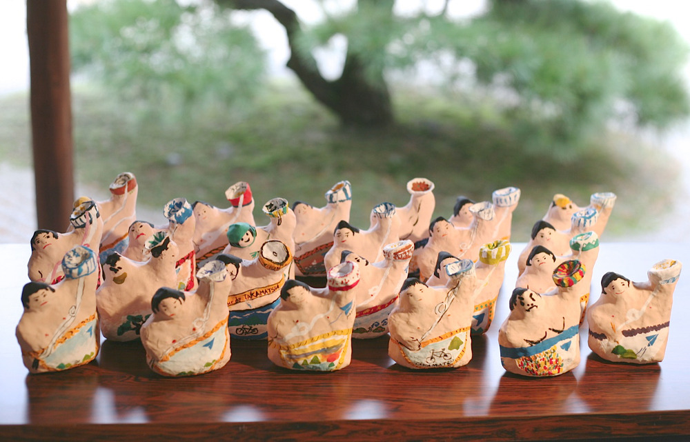 Sumo wrestler ornaments made by the group during a visit to Takamatsu