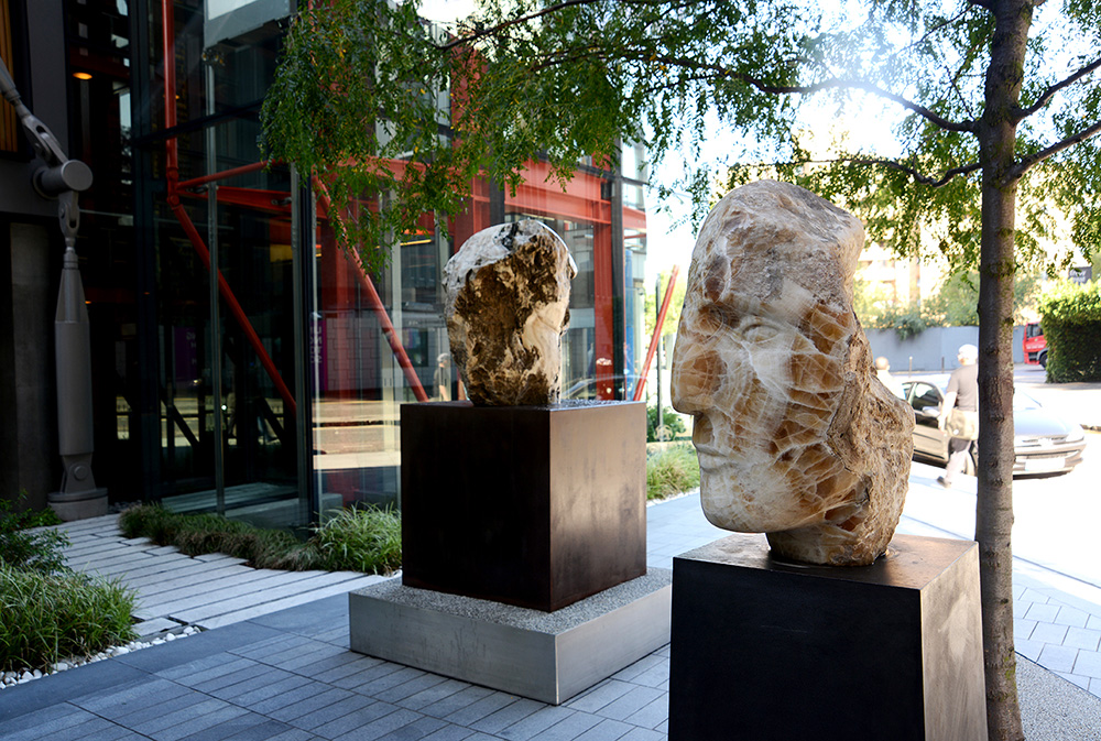 Emily Young, Mont Amiata Warrior, clastic igneous rock in situ at NEO Bankside, 51x41x47 cm, 2012. © Emily Young, courtesy of The Fine Art Society.