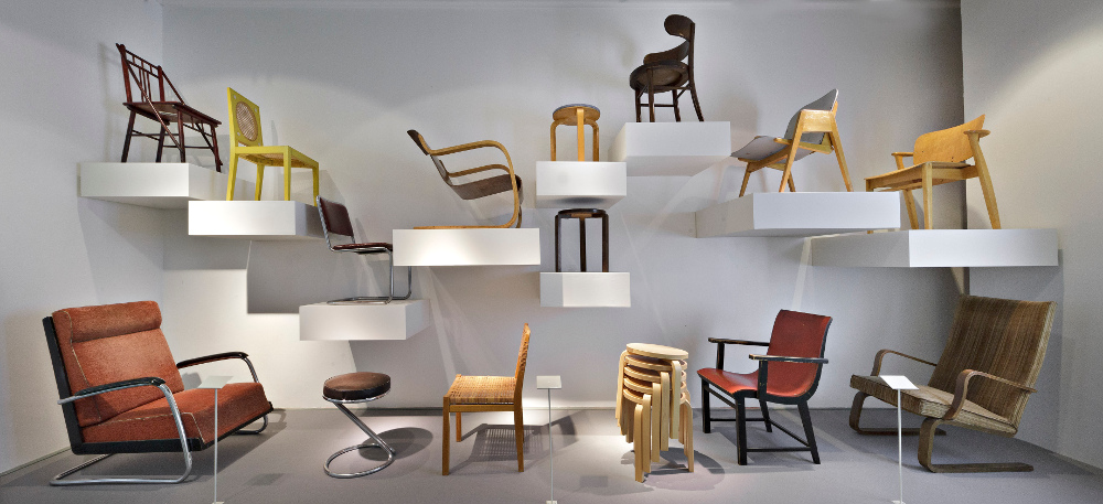 Artek stool 60 (centre display and stacked) at the Helsinki Designmuseo © Rauno Träskelin.