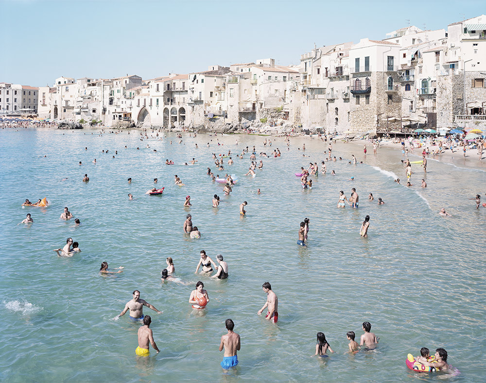 Massimo Vitali, Cefalu’ Orange Yellow Blue, 2008, direct analog print on Diasec mount, 180 x 230 cm, courtesy the artist and Ronchini Gallery