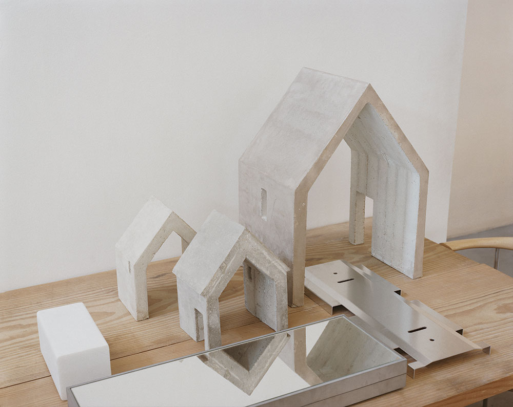 Study models and prototypes on a table in Pawson’s studio