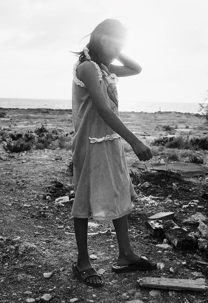 Khawla, 12 years old, at the makeshift camp where she lives near Tripoli, Lebanon. September 2014