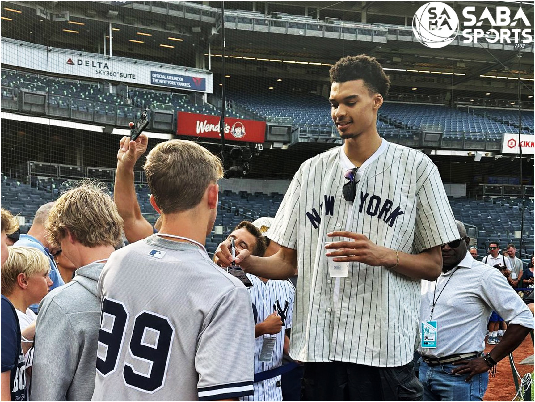 Victor Wembanyama throws out ceremonial first pitch at Yankee Stadium ahead  of NBA draft