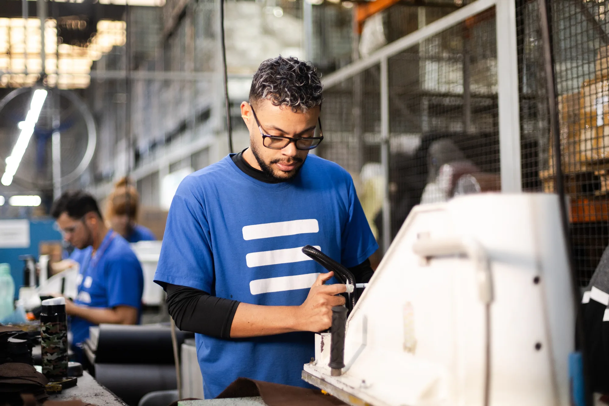 Safetline employees in the factory shipping area