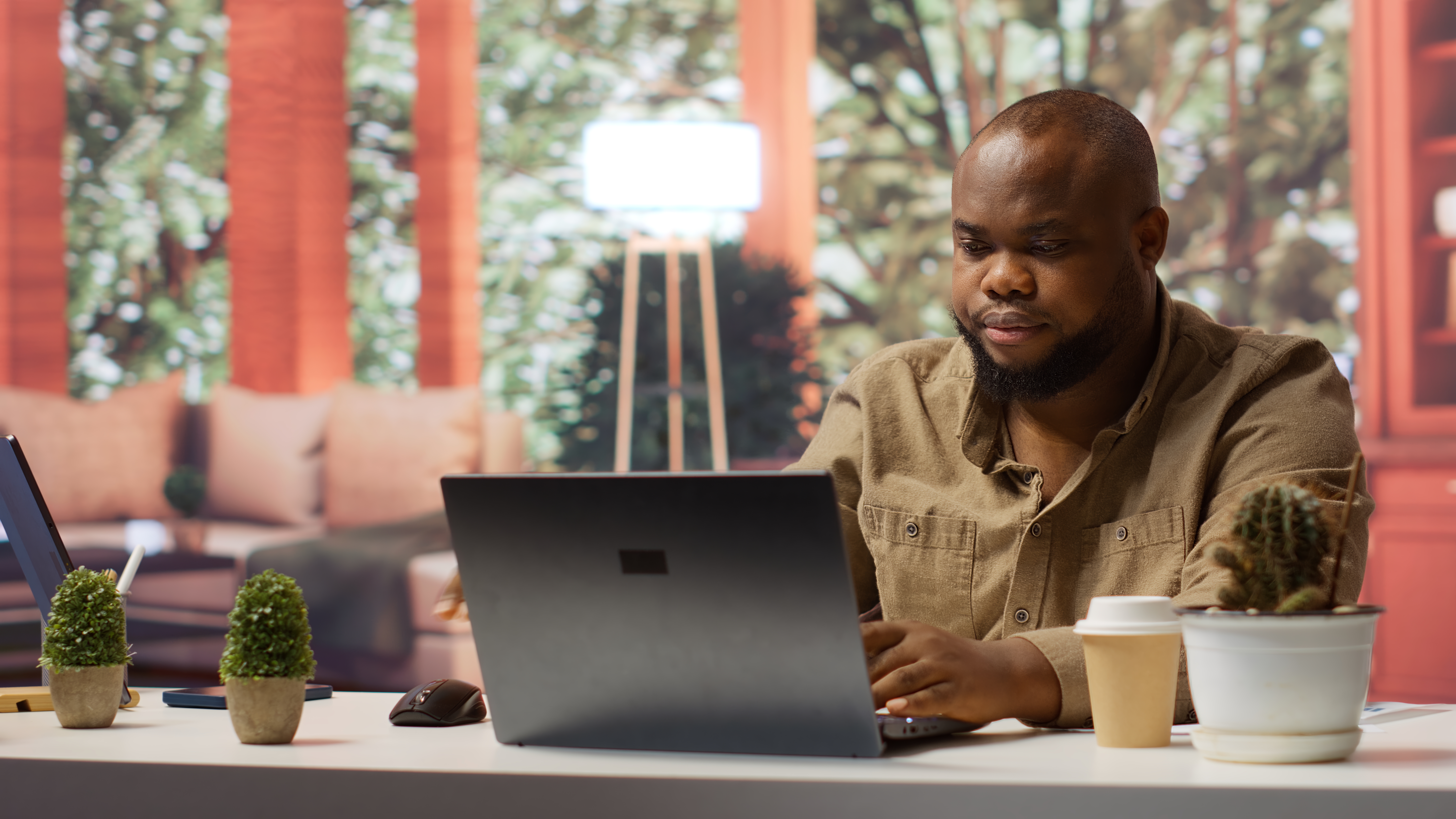 African freelancer at desk