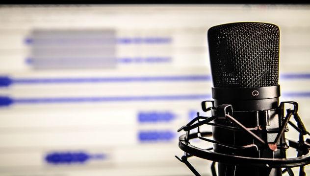 microphone and recording software set up for podcasting