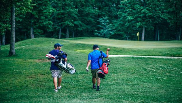 two men golfing