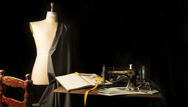 a mannequin and sewing machine in a tailors