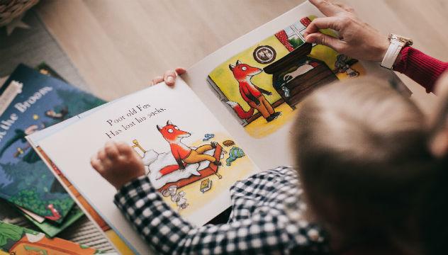 child being read a story