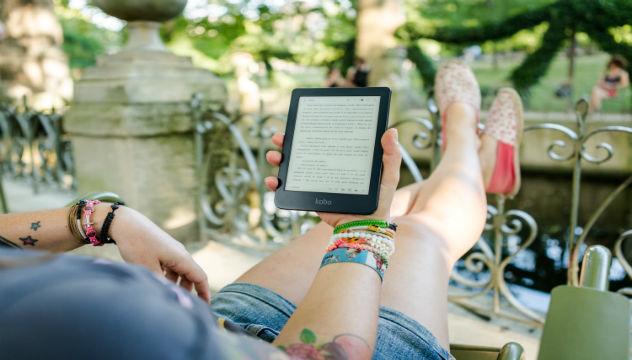 Person Reading a Kindle